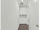 Hallway with built-in cabinets and hardwood floors at 1819 Capstone Dr, Durham, NC 27713