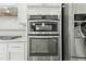 Stainless steel double oven and microwave in a modern kitchen at 1819 Capstone Dr, Durham, NC 27713