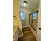 Bathroom features a large shower and updated flooring at 209 Carolyn Dr, Benson, NC 27504