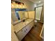 Bathroom boasts granite countertop vanity and a shower at 209 Carolyn Dr, Benson, NC 27504