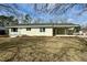 Newly renovated ranch home features a covered porch and well-manicured lawn at 209 Carolyn Dr, Benson, NC 27504