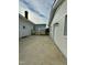 Rear exterior view showing patio and additional building at 209 Carolyn Dr, Benson, NC 27504