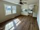 Bright and spacious living area with new flooring and lots of natural light at 209 Carolyn Dr, Benson, NC 27504