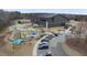 Aerial view showcases the Joyner Park playground with colorful play structures and an adjacent parking area at 210 W Oak Ave, Wake Forest, NC 27587