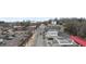 Street view with traffic and parking at 210 W Oak Ave, Wake Forest, NC 27587