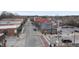 Street view of shops and businesses, plus parking spots at 210 W Oak Ave, Wake Forest, NC 27587