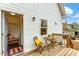Outdoor back deck with a seating area and a view of the house at 211 Long Ave, Graham, NC 27253