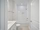 Clean bathroom with white vanity sink, tub, and toilet at 212 War Admiral Dr, Clayton, NC 27520