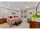 King-size bedroom with window and recessed lighting at 212 War Admiral Dr, Clayton, NC 27520