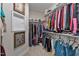 Large walk-in closet with shelving and hanging rods at 212 War Admiral Dr, Clayton, NC 27520