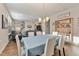 Dining area with a hutch and a light blue tablecloth on the table at 212 War Admiral Dr, Clayton, NC 27520