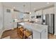 Modern kitchen with white cabinets, quartz countertops and stainless steel appliances at 212 War Admiral Dr, Clayton, NC 27520