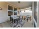 Screened porch with comfortable seating and outdoor rug at 212 War Admiral Dr, Clayton, NC 27520