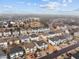 Real estate aerial view showcases a residential neighborhood with well-maintained homes and tree-lined streets at 2321 Turtle Point Dr, Raleigh, NC 27604