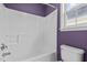 Full bathroom featuring a tub and shower combination with a nearby window at 2321 Turtle Point Dr, Raleigh, NC 27604