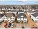 Charming two-story home with a well-manicured lawn and inviting curb appeal in a Gathering-friendly neighborhood at 2321 Turtle Point Dr, Raleigh, NC 27604