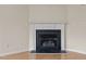 Gas fireplace with white mantel in a corner at 2321 Turtle Point Dr, Raleigh, NC 27604