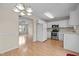 Spacious kitchen featuring stainless steel appliances, white cabinets, and an open layout at 2321 Turtle Point Dr, Raleigh, NC 27604