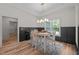 Bright dining room with modern chandelier and natural light at 260 Ellington Rd, Graham, NC 27253