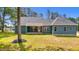 Charming home with blue siding and a covered front porch at 260 Ellington Rd, Graham, NC 27253