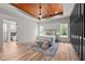 Spacious main bedroom with a coffered ceiling and lots of natural light at 260 Ellington Rd, Graham, NC 27253