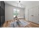 Bright home office featuring modern lighting, stylish desk, and ample storage at 260 Ellington Rd, Graham, NC 27253