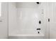 Bright new shower with a black shower head and new fixtures in an updated home at 260 Ellington Rd, Graham, NC 27253