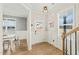 Bright entryway with hardwood floors, white trim, and views into the dining area at 289 E Goodwin Chase Ln, Wendell, NC 27591