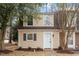Charming two-story townhome featuring a classic design and inviting entrance at 3 Patriot Cir, Durham, NC 27704