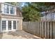 Patio area with wooden fence and access to backyard at 3 Patriot Cir, Durham, NC 27704