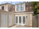 Townhouse back with French doors leading to patio at 3 Patriot Cir, Durham, NC 27704