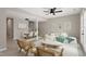 Bright living room with modern furniture, light wood floors, and French doors at 3 Patriot Cir, Durham, NC 27704