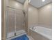 Bathroom with soaking tub and walk-in shower at 317 W Morgan Street # 405, Raleigh, NC 27601
