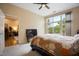 Bright bedroom with large windows and an adjacent doorway at 317 W Morgan Street # 405, Raleigh, NC 27601