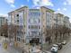Exterior view of The Dawson building, a modern multi-story residential building at 317 W Morgan Street # 405, Raleigh, NC 27601