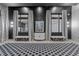 Elegant lobby with modern seating, art, and decorative lighting at 317 W Morgan Street # 405, Raleigh, NC 27601
