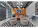 Lobby sitting area with modern furniture and a large chandelier at 317 W Morgan Street # 405, Raleigh, NC 27601