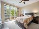 Bedroom featuring lots of light and access to private balcony at 317 W Morgan Street # 405, Raleigh, NC 27601