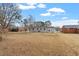 Large backyard with mature trees and open space at 322 Pace St, Smithfield, NC 27577