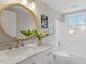 Modern bathroom with a large vanity and a bathtub at 322 Pace St, Smithfield, NC 27577