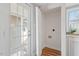 Bright laundry room with built-in shelving and exterior access at 322 Pace St, Smithfield, NC 27577