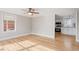 Bright living room with hardwood floors and ceiling fan at 322 Pace St, Smithfield, NC 27577