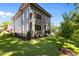 Expansive backyard featuring a modern two-story home with a well-manicured lawn at 324 Waldo St, Cary, NC 27511