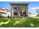 Beautiful backyard featuring lush green grass and a modern two-story home at 324 Waldo St, Cary, NC 27511
