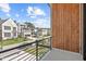 Outdoor view from the balcony showcasing neighborhood with modern architecture at 324 Waldo St, Cary, NC 27511