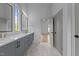 Elegant bathroom with dual vanities, modern fixtures, and marble flooring at 324 Waldo St, Cary, NC 27511