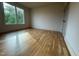 Bright bedroom with wood floors and large windows providing a lot of natural light at 324 Waldo St, Cary, NC 27511