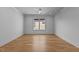 Spacious bedroom featuring hardwood floors, recessed lighting, and a ceiling fan at 324 Waldo St, Cary, NC 27511
