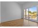Bedroom featuring hardwood floors and a sliding door leading to a private balcony at 324 Waldo St, Cary, NC 27511