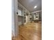 Spacious walk-in closet with custom shelving and wood flooring at 324 Waldo St, Cary, NC 27511
